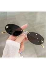 Women's Oval Sunglasses with Black Frame and UV400 Protection - Image 2