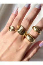 Women's Gold-Tone 4-Piece Designer Ring Set - Stylish and Modern Combination - Image 2